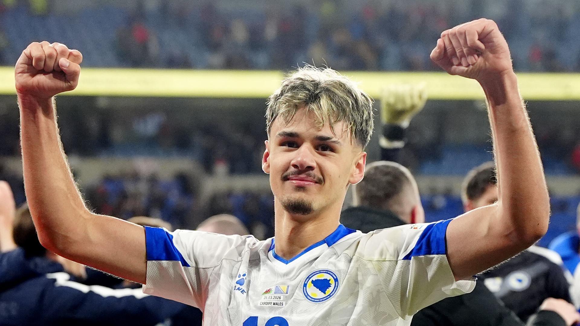 Kerim Alajbegovic celebrates Bosnia and Herzegovina's victory.