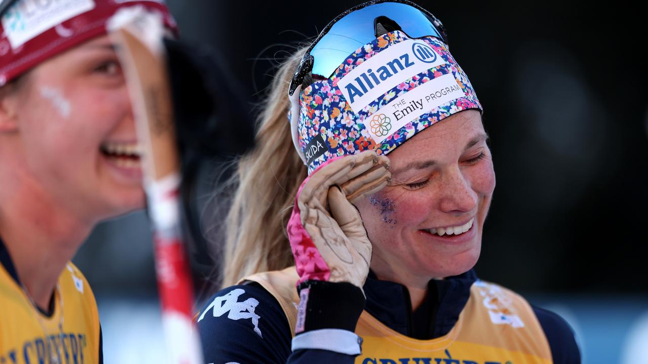 Diggins celebrates on the Alpe Cermis