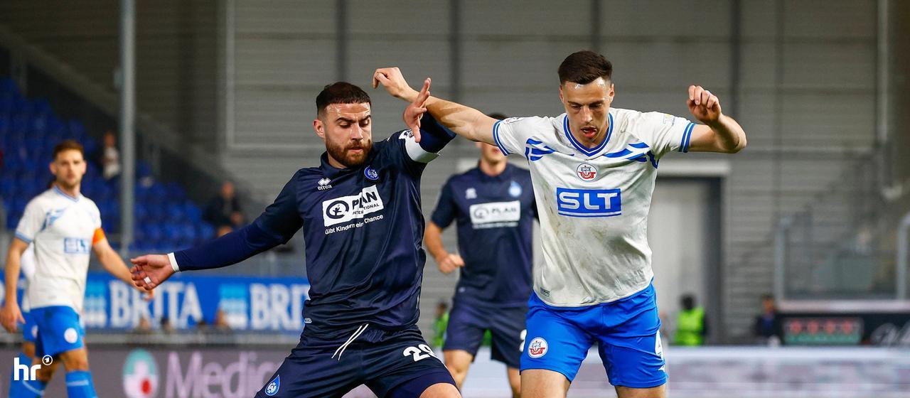 SVWW-Kapitän Fatih Kaya (links) im Spiel gegen Hansa Rostock