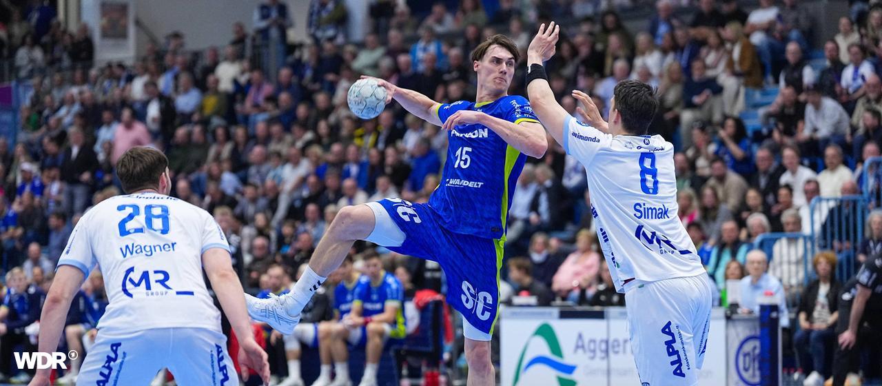 Miro Schluroff (M.) vom VfL Gummersbach im Spiel gegen den TBV Lemgo Lippe.