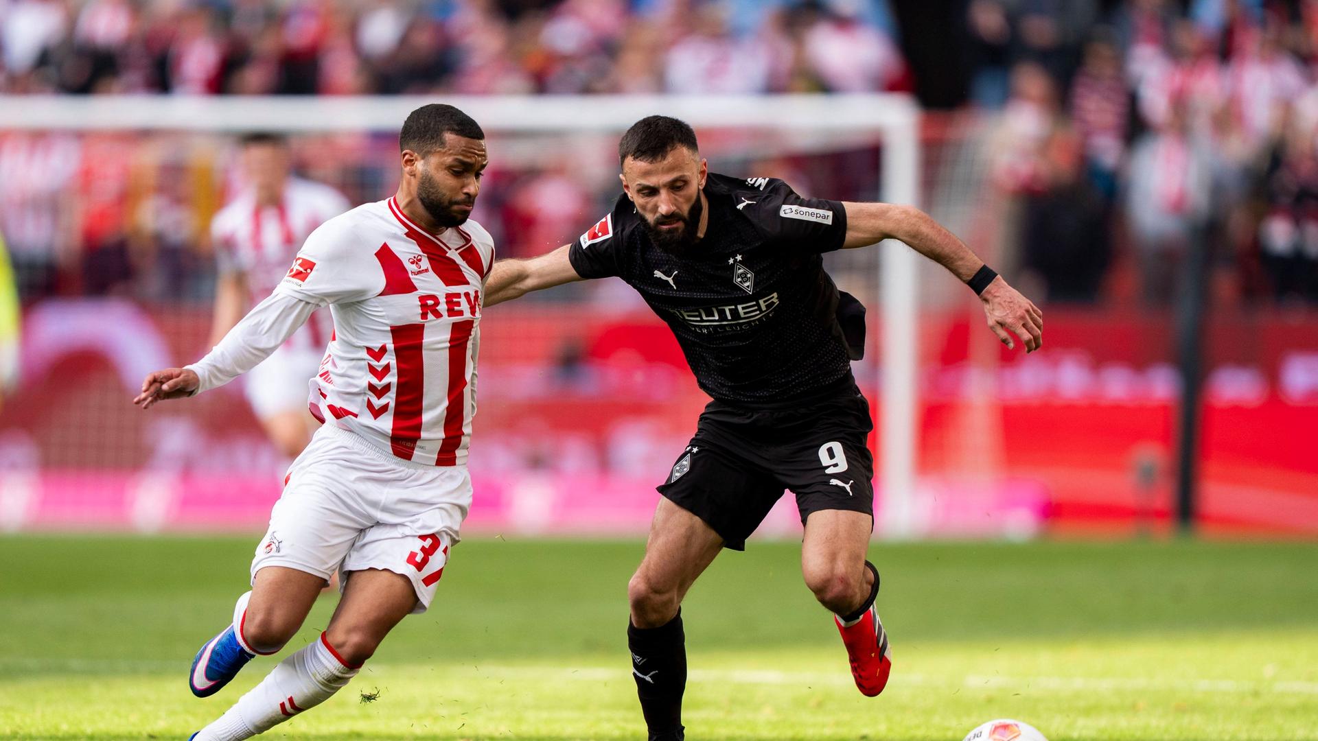 Linton Maina y Franck Honorat en un duelo | IMAGO/HMB-Media