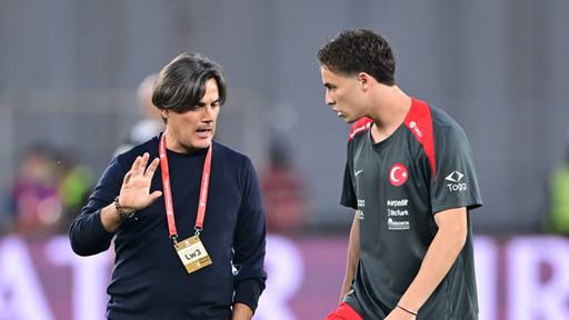 Vincenzo Montella (L.) und Kenan Yildiz (R.)