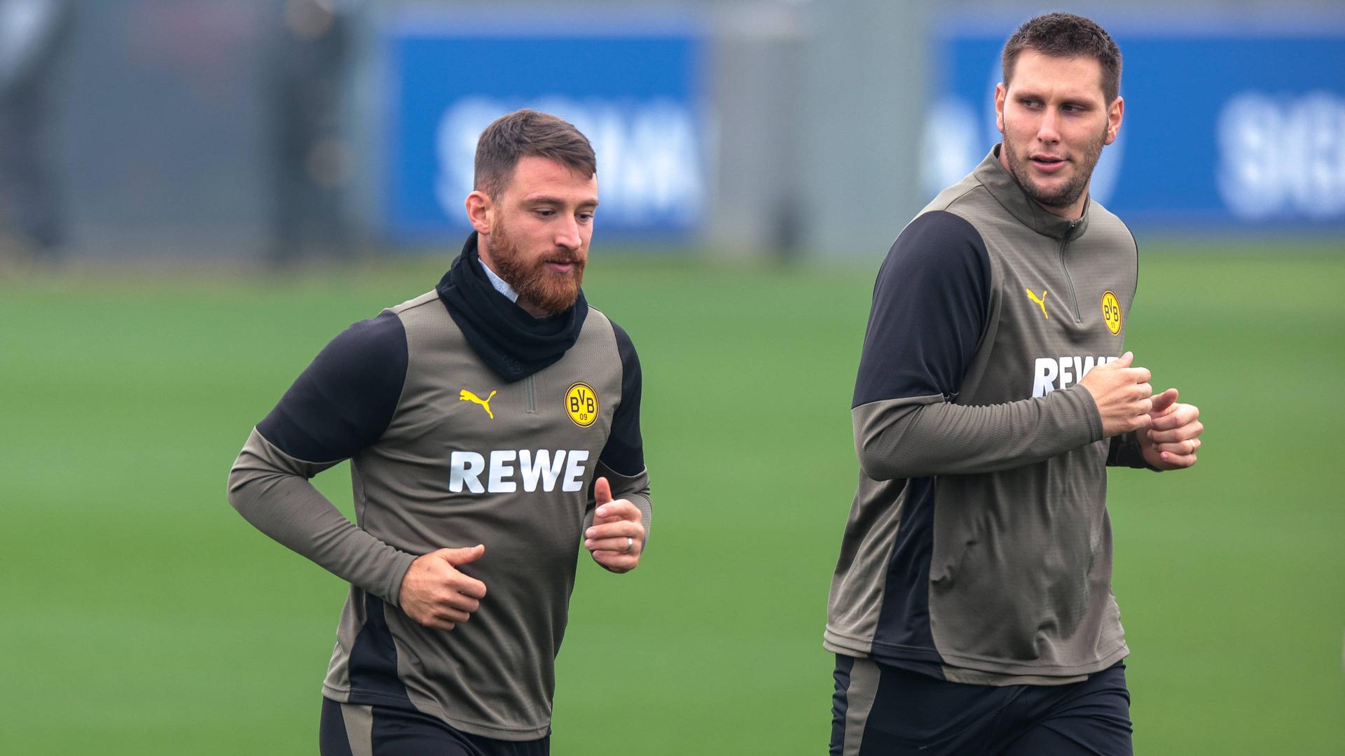 Niklas Süle and Salih Özcan together during training