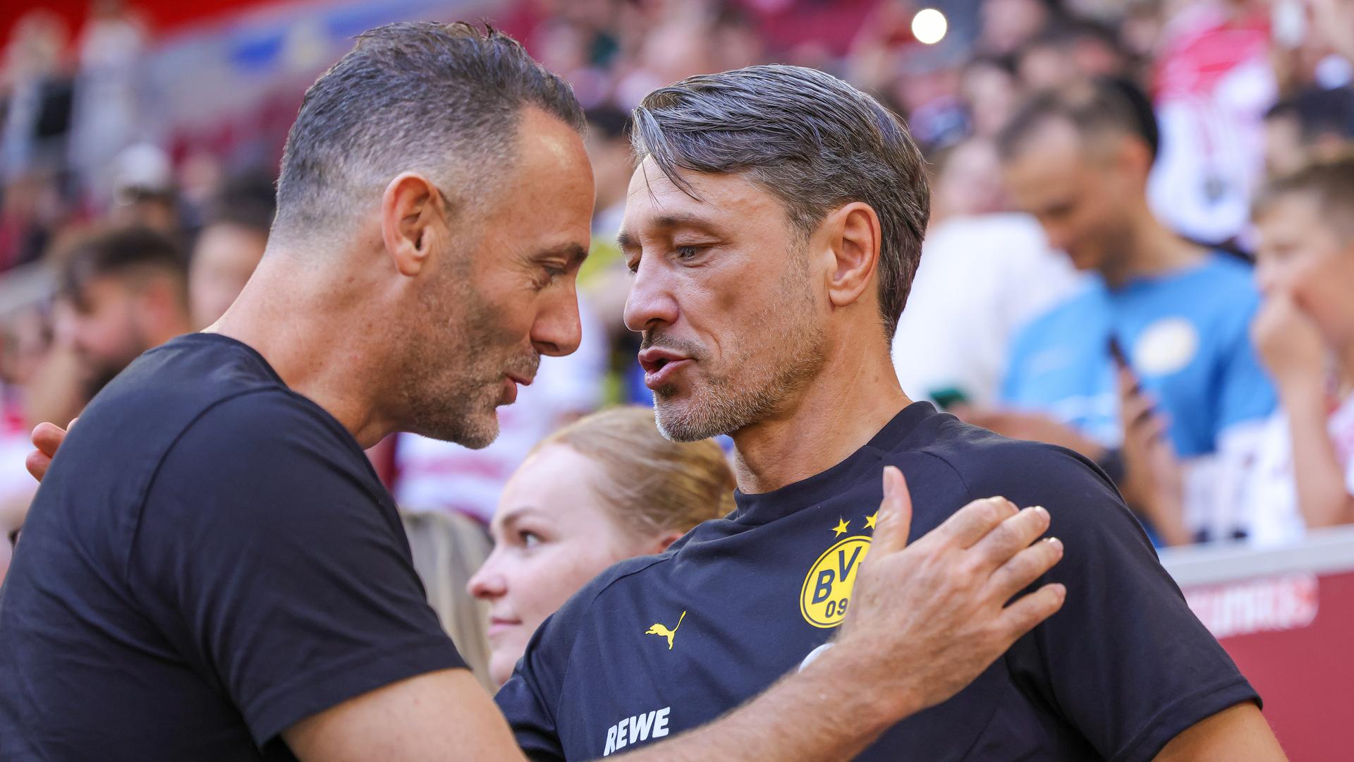 BVB-Trainer Niko Kovac (r.) vor Anpfiff mit Fortuna-Trainer Alexander Ende | Ralf Ibing /firo Sportphoto