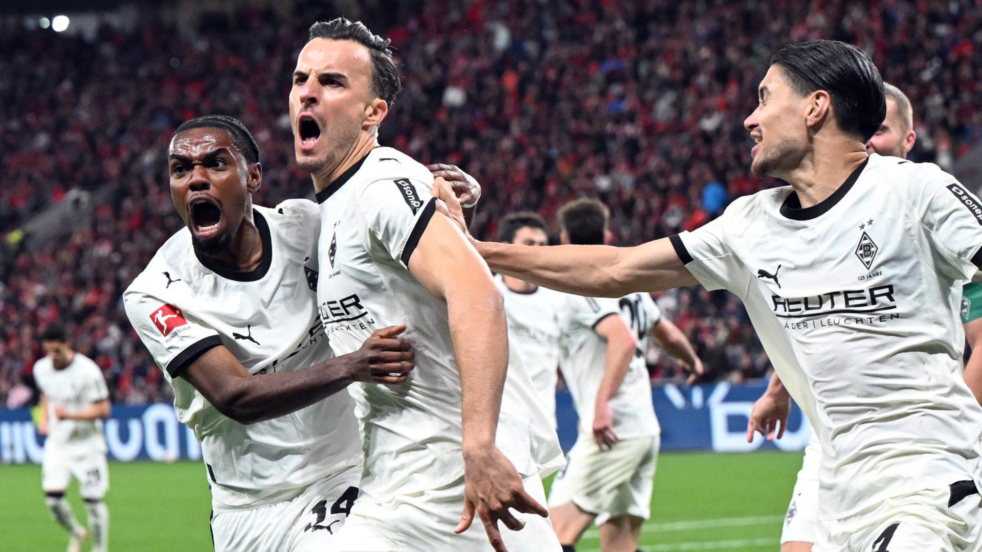 Haris Tabakovic (m.) jubelt über seinen Treffer zum 1:1 Ausgleich | Federico Gambarini/dpa