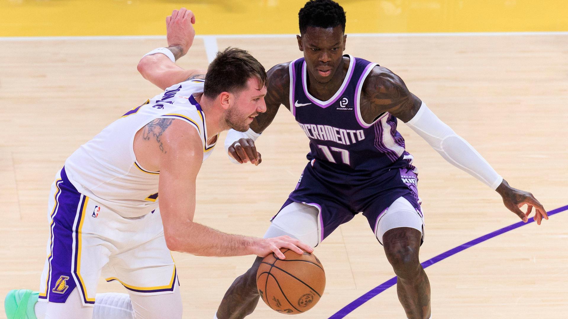 Luka Doncic (l.) im Zweikampf mit Dennis SchrÃ¶der (r.) | IMAGO / ZUMA Press Wire