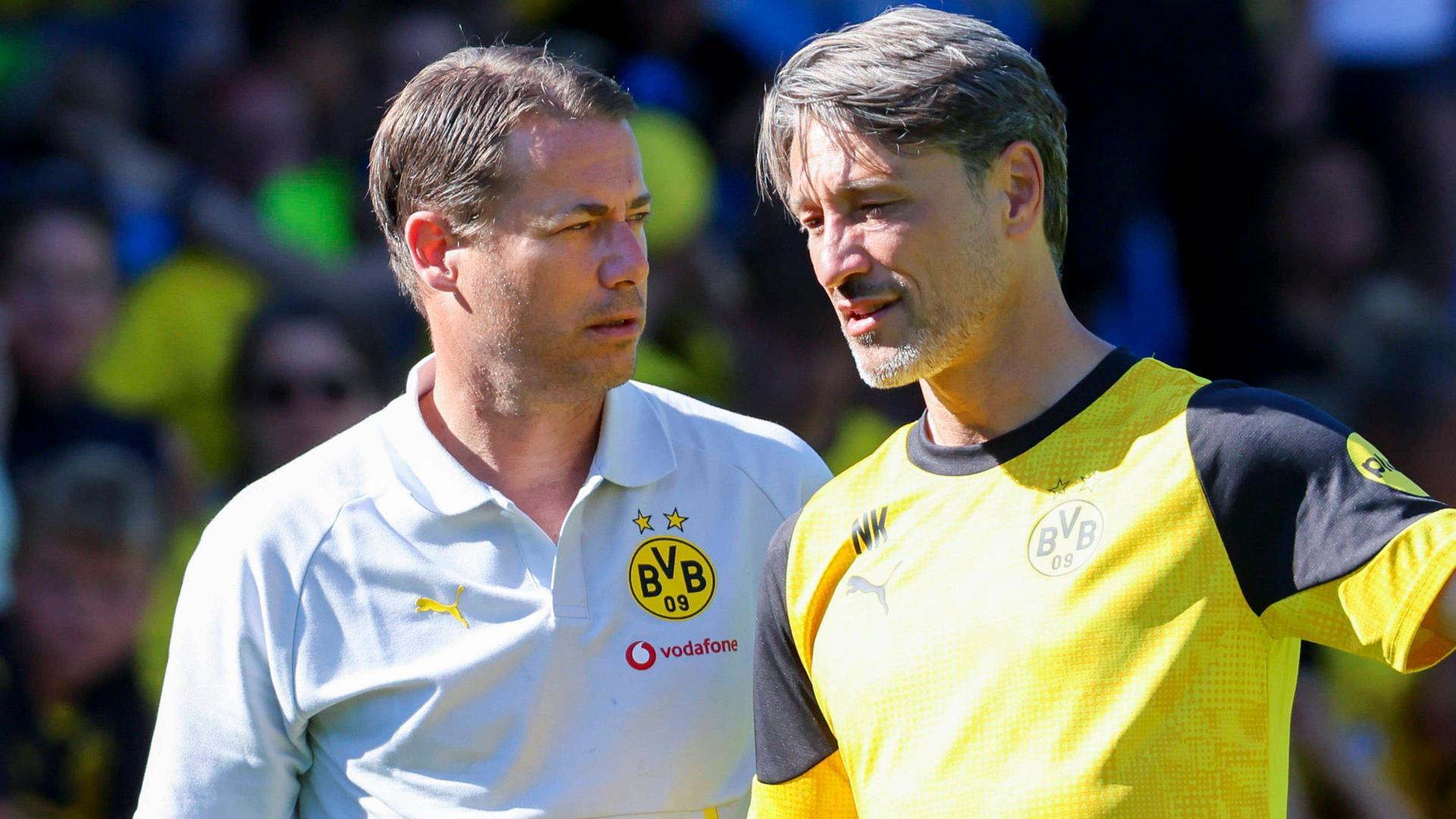 Borussia Dortmunds Sportgeschäftsführer Lars Ricken (l.) mit Trainer Nico Kovac. | IMAGO/Marco Steinbrenner/DeFodi Images
