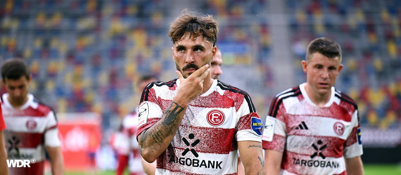 Fabian Schleusener (Mitte) und Dominique Heintz (rechts) von Fortuna Düsseldorf sind enttäuscht.