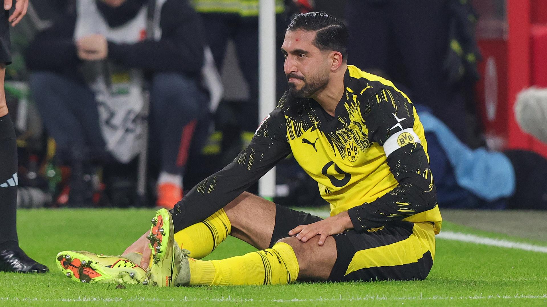 El capitán del BVB, Emre Can, se lesionó en el partido clave contra el FC Bayern de Múnich.