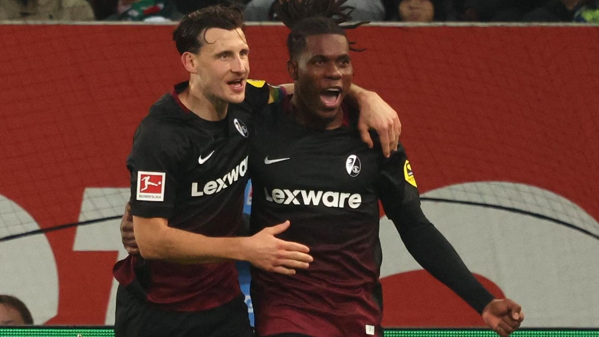 Freiburgs SiegtorschÃ¼tze Cyriaque IriÃ© (r.) jubelt mit Maximilian Eggestein | Karl-Josef HILDENBRAND / AFP