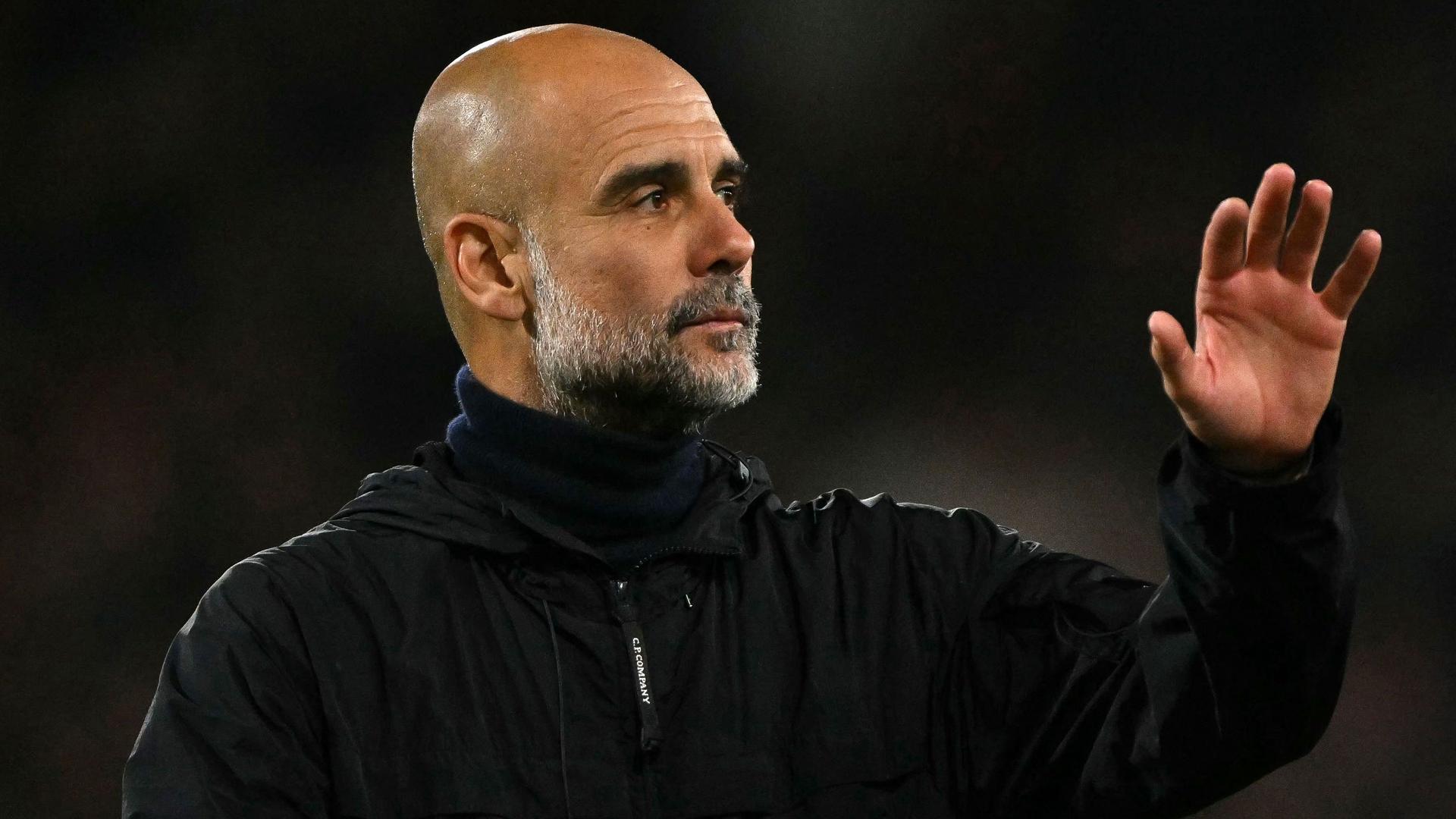 Pep Guardiola | AFP/Glyn Kirk