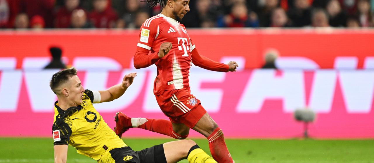 Nico Schlotterbeck grätscht Bayerns Michael Olise ab