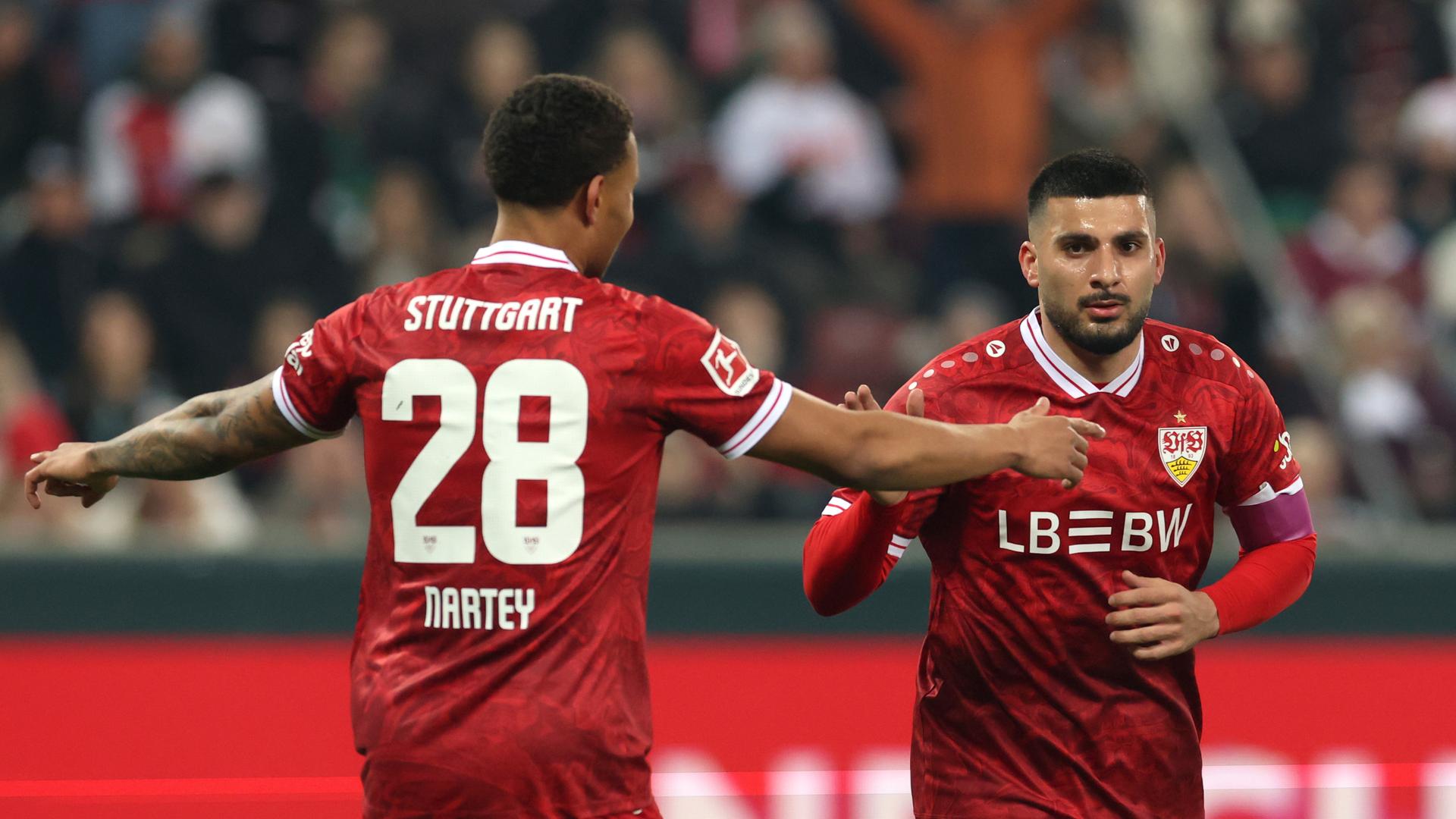 Stuttgart’s Deniz Undav (right) and Nikolas Nartey celebrate a goal during the match against Augsburg.