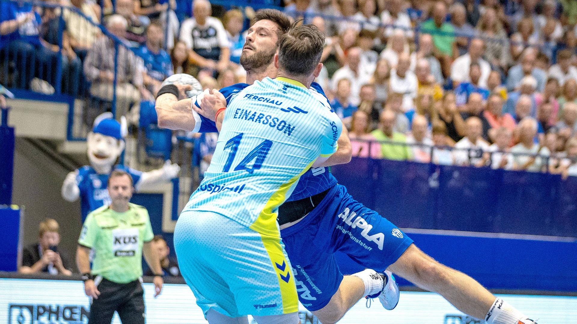 Handballprofi Tim Suton (l.) im Bundesligaspiel mit seinem TBV Lemgo Lippe gegen den VfL Gummersbach | imago/Koch