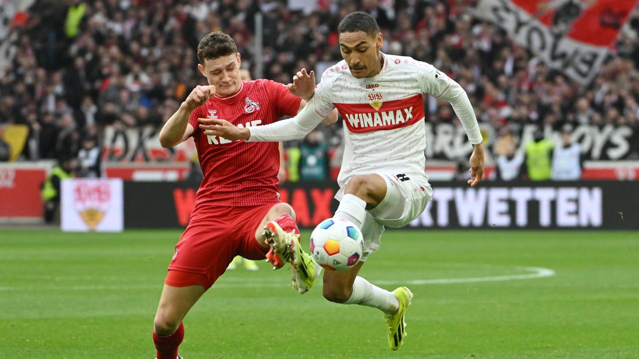Zweikampf zwischen Eric Martel (1. FC Köln) und Enzo Milot (VfB Stuttgart) | dpa/Marijan Murat