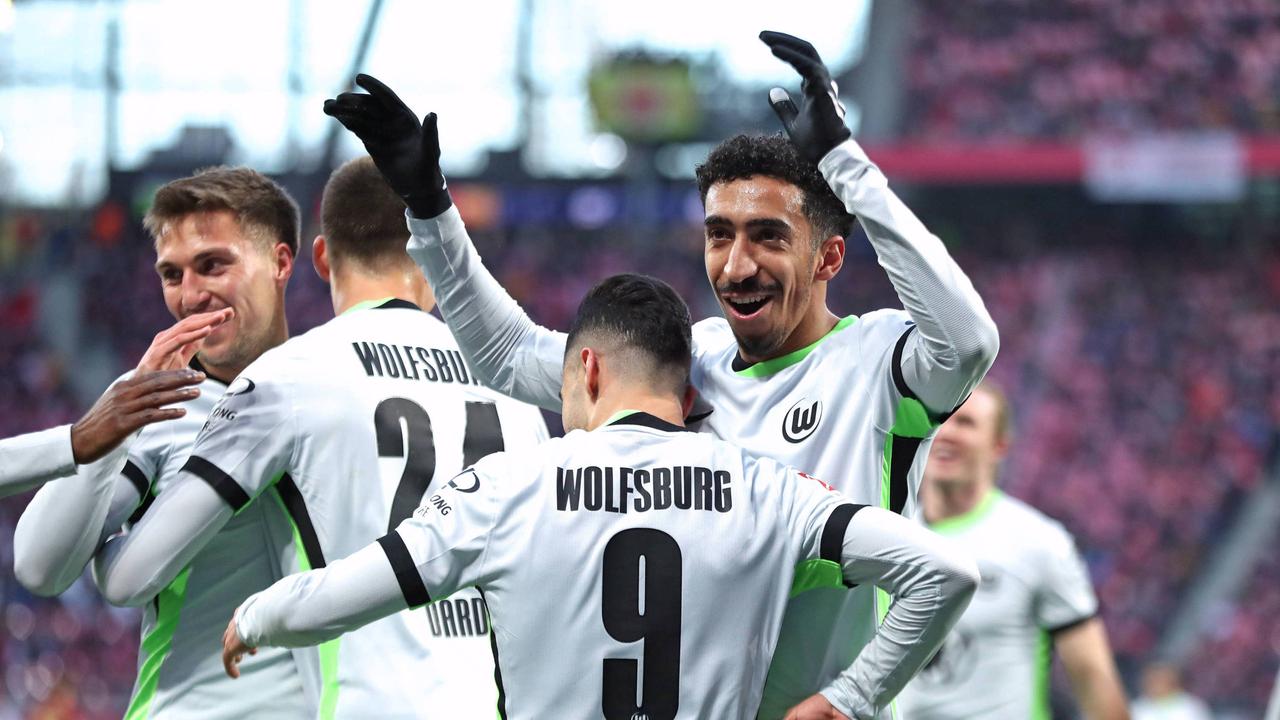 Wolfsburgs Spieler jubeln nach einem Tor gegen RB Leipzig | IMAGO/Beautiful Sports