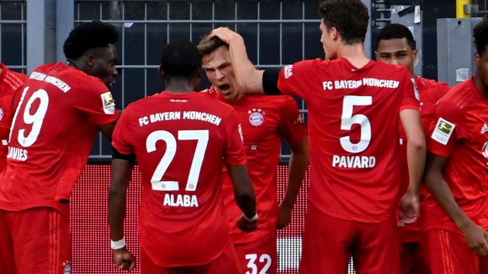 Bayerns Kimmich jubelt im Spiel in Dortmund | AFP/Gambarini Bayerns Kimmich jubelt im Spiel in Dortmund